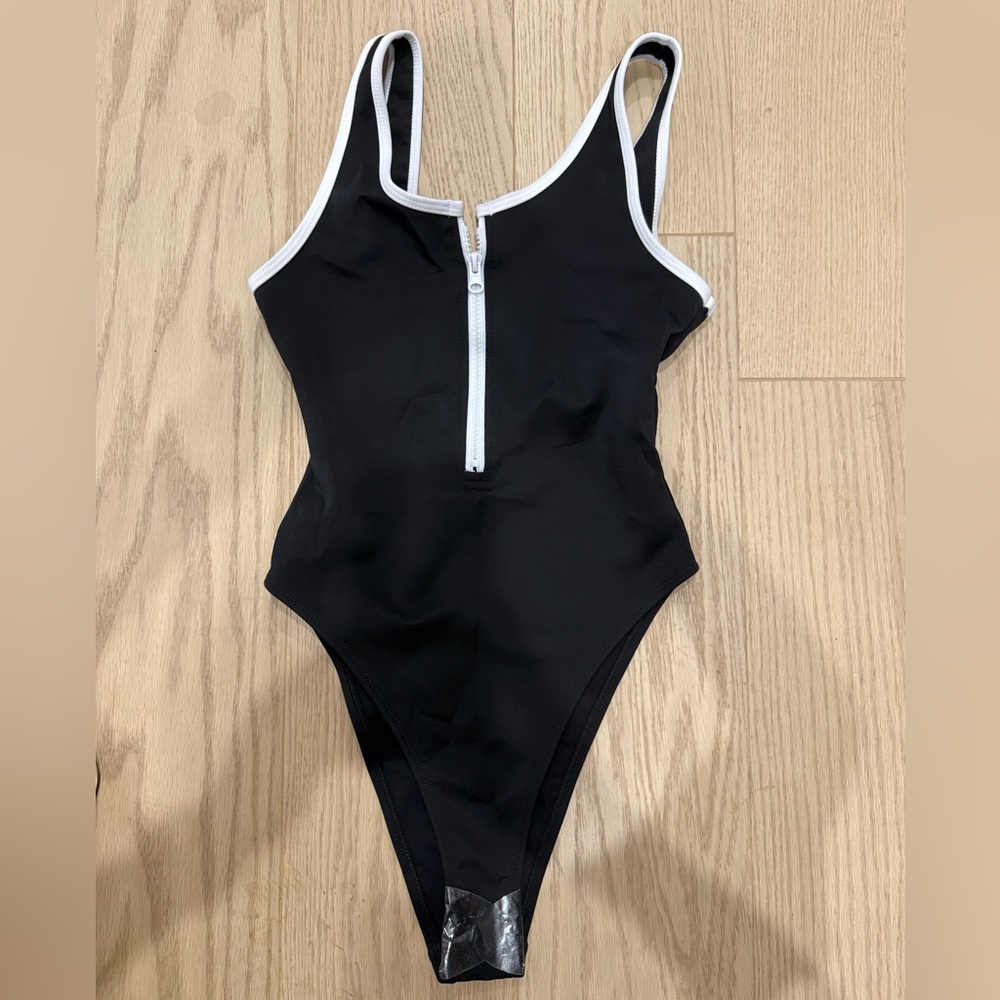 Brand new never worn Black size XS one piece swimsuit